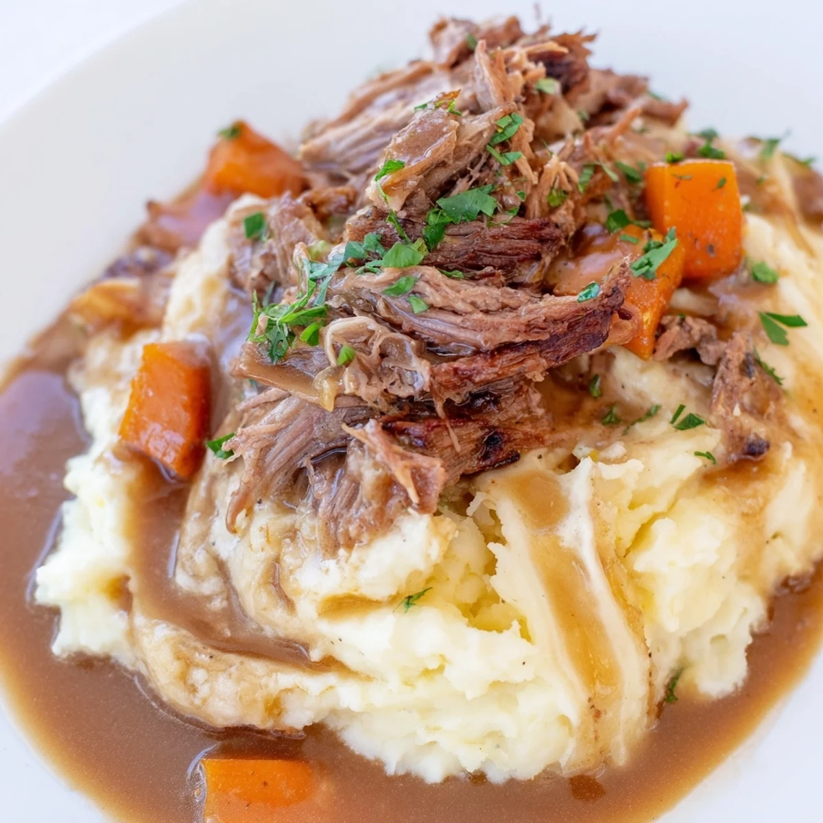 Savor the comforting aroma of a classic Slow Cooker Pot Roast meal, perfect for any family dinner.