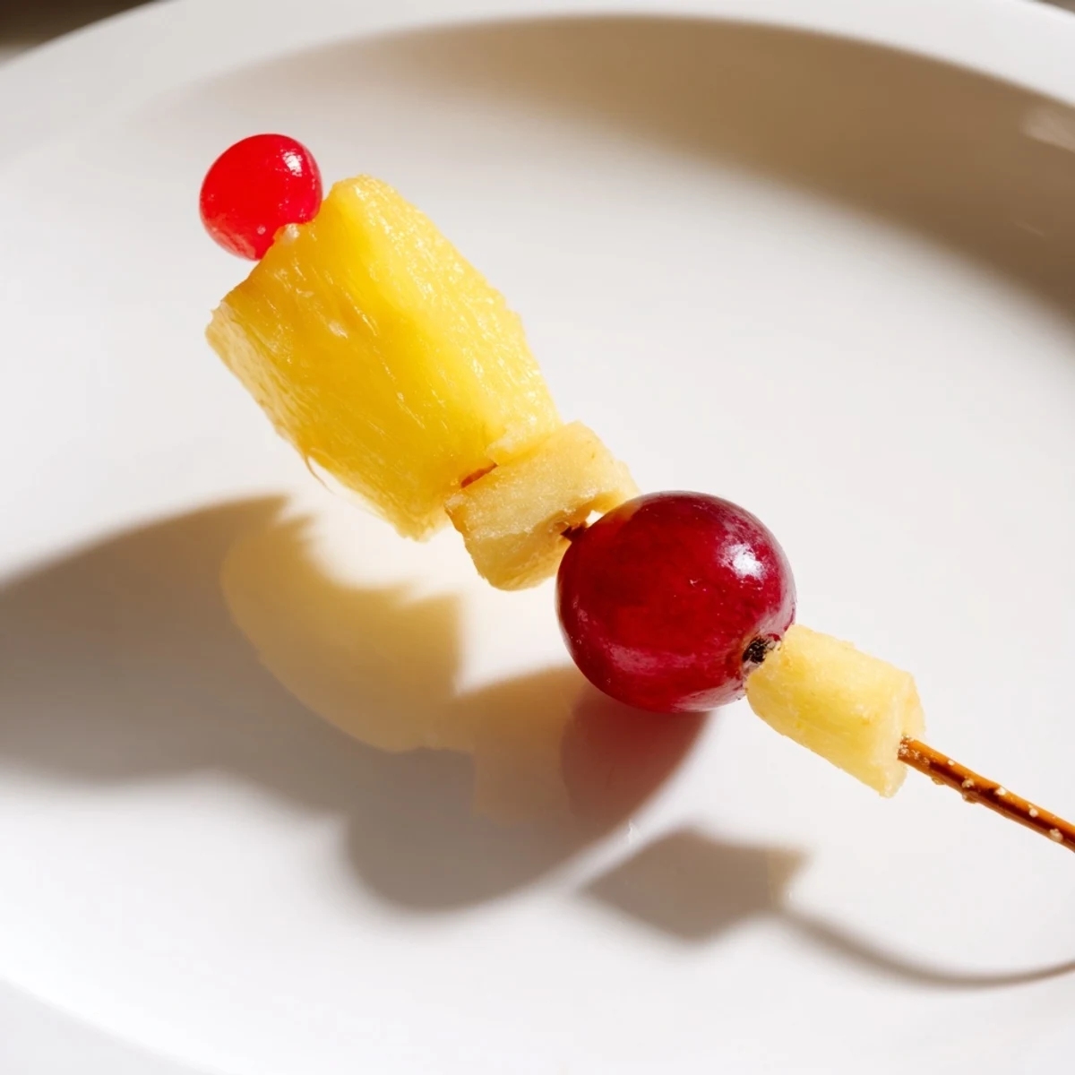 Bright, colorful Christmas Light Fruit Skewers offer a refreshing, healthy treat for holiday parties.