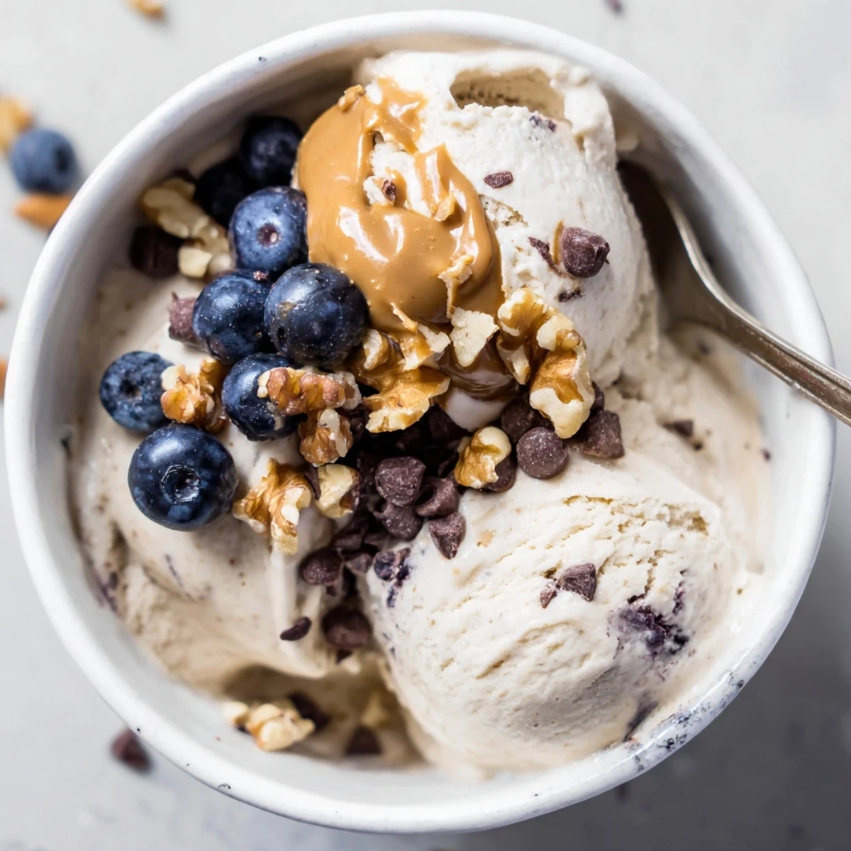 Picture of a smooth, blended Protein Ice Cream Bowl with optional chocolate chips; perfect treat.