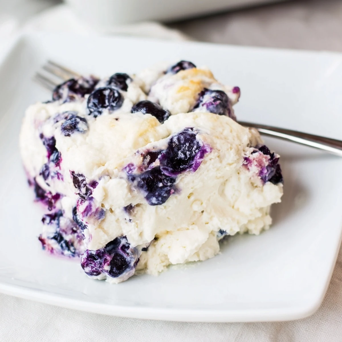 Warm Blueberry Cottage Cheese Bake, baked until golden, ready to slice and serve.