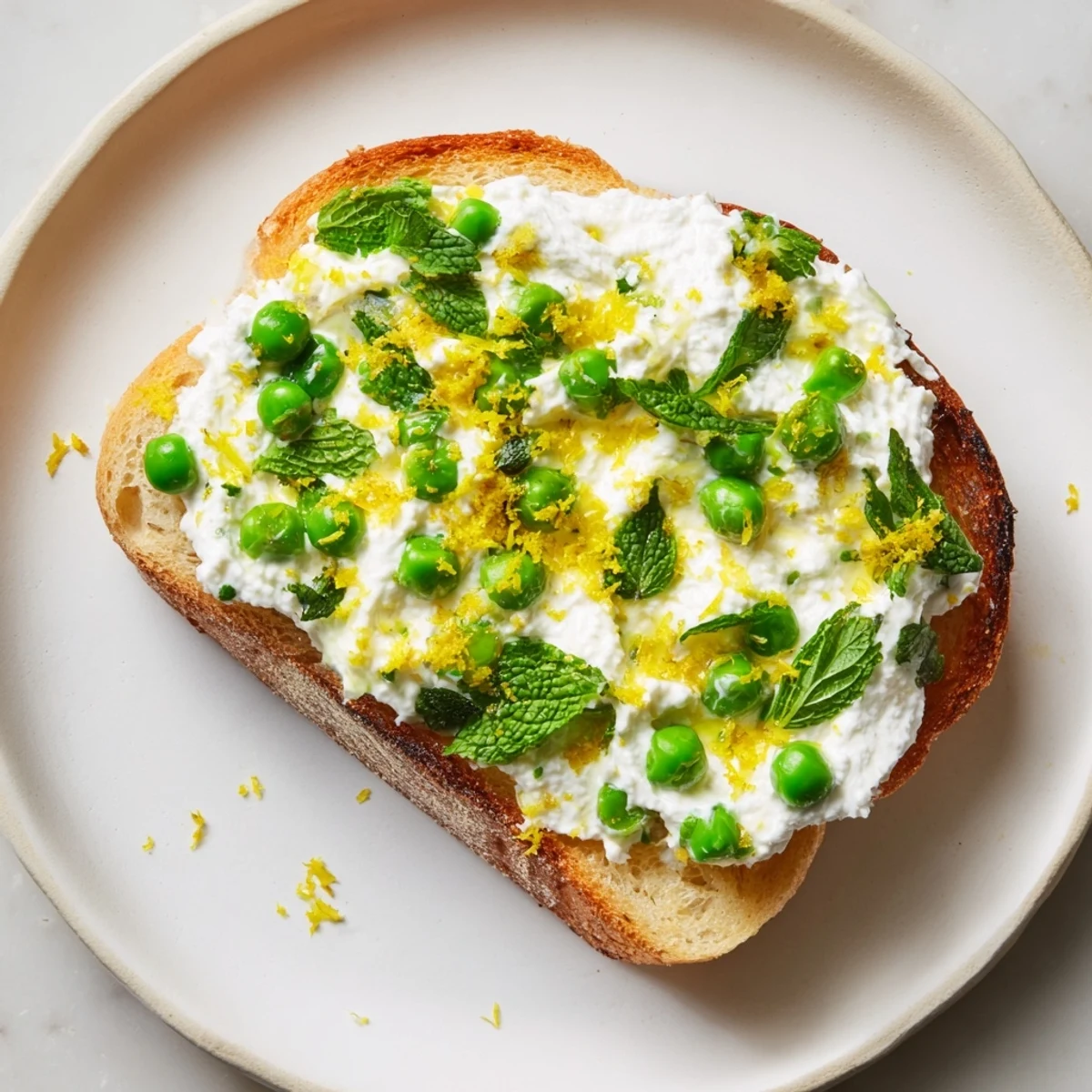 Pepper Ricotta Toast Pea and Mint Ricotta Toast with Lemon Zest