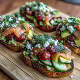 Spring Brunch Avocado Toast Board with Smoked Salmon, a colorful and inviting spread of creamy avocado, fresh veggies, and savory salmon perfect for sharing.