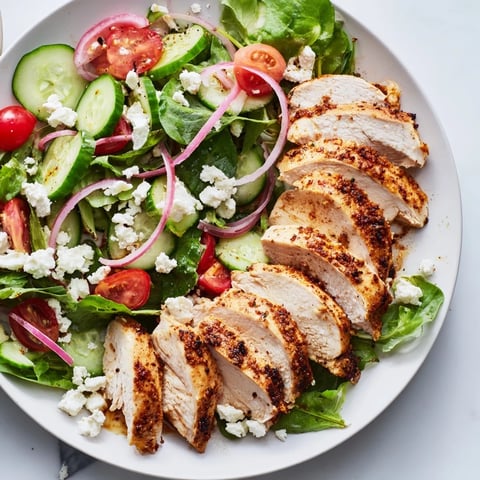 Quick Pan-Seared Chicken Salad with glistening seared chicken atop fresh salad greens, ready to enjoy.