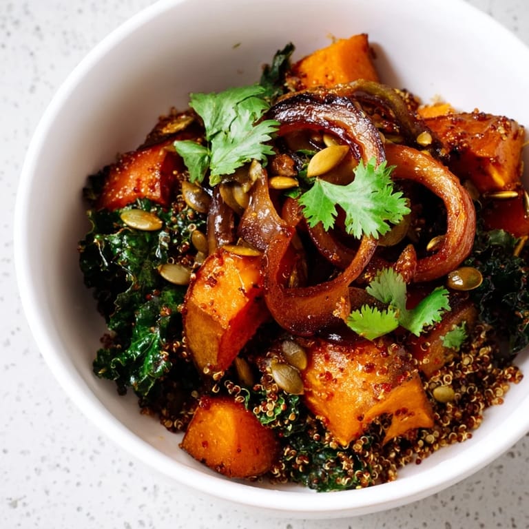 Hearty, flavorful red kuri squash bowl with toasted pepitas, a delightful vegetarian main.