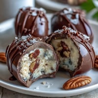 Dubai Chocolate Strawberry Easter Eggs with Crunch Filling, featuring a crisp strawberry-chocolate shell and golden hazelnut filling.