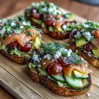 Spring Brunch Avocado Toast Board with Smoked Salmon, a colorful and inviting spread of creamy avocado, fresh veggies, and savory salmon perfect for sharing.