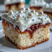 A beautifully moist sheet cake adorned with smooth pearl fondant, perfect for a First Communion celebration.